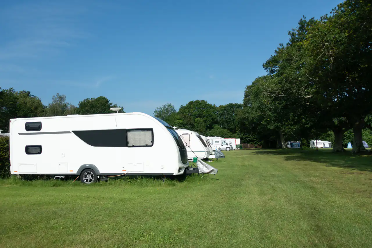 The peaceful caravan park at Chertsey with pitches and mature trees